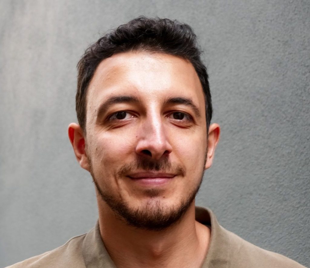 A profile picture of Yunus Emre Oruc, a digital strategist and consultant